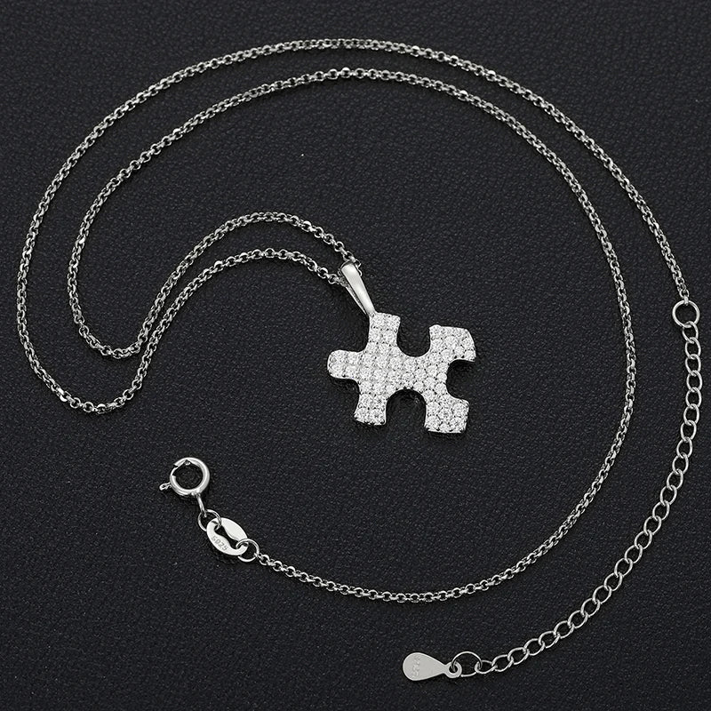 Moissanite Puzzle Piece Pendant Necklace in Sterling Silver